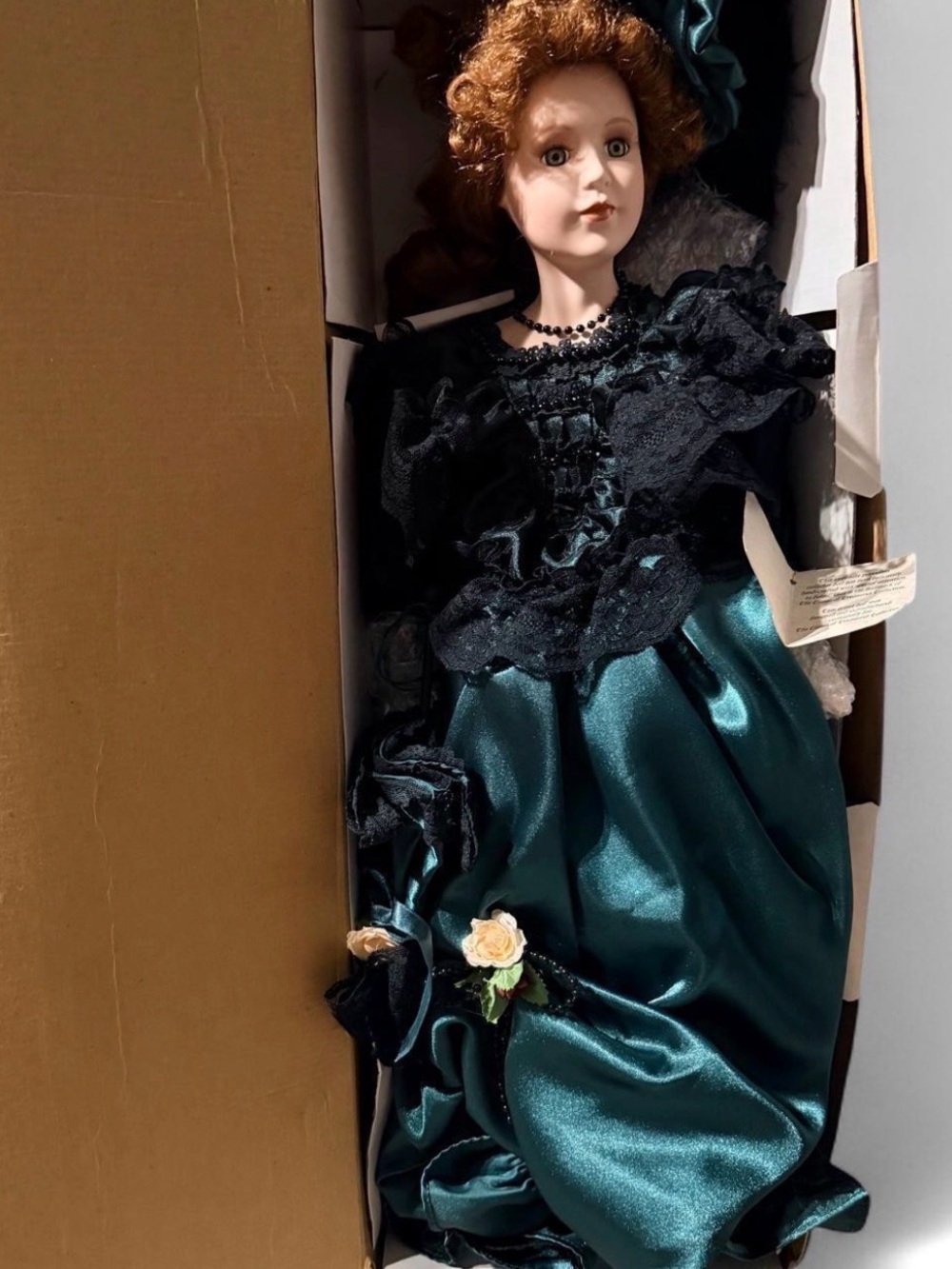 Vintage-Style Porcelain Doll in Teal and Black Dress - Brand Unspecified